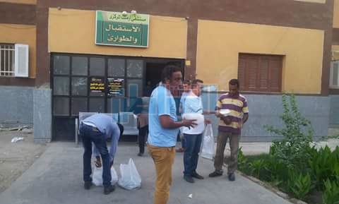 بالصور.. "ميدان الجنوب ونايل بلاس" توزعان الوجبات الغذائية على المواطنين بالأقصر
