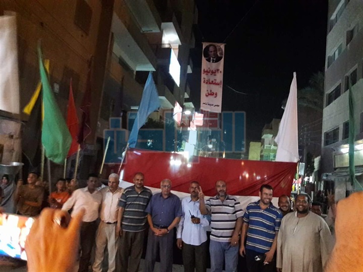 بالصور.. أهالي "ناصر " شمال بني سويف يحتفلون بذكرى "30 يونيه"