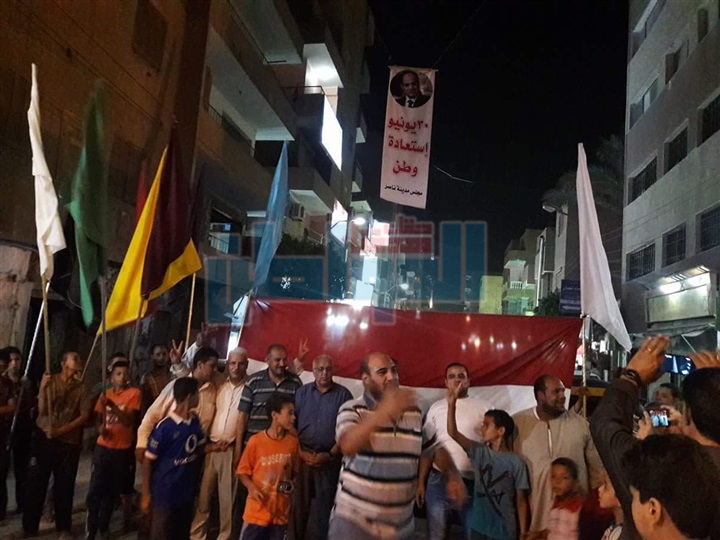 بالصور.. أهالي "ناصر " شمال بني سويف يحتفلون بذكرى "30 يونيه"