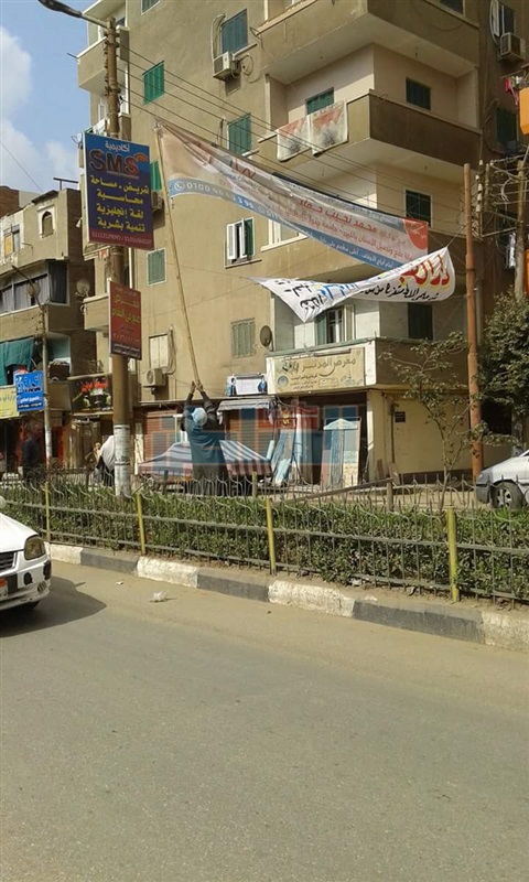 بالصور.. إزالة 43 إعلان دون ترخيص بشوارع مدينة بنى سويف