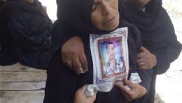 بالصور.. والدة ضحية