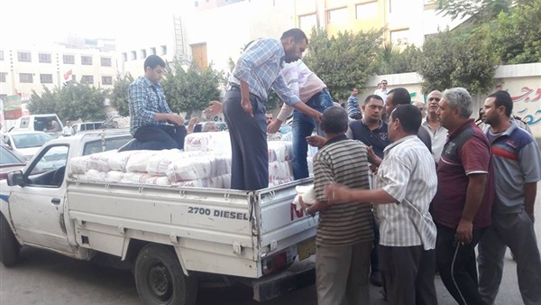 توزيع 10 طن سكر