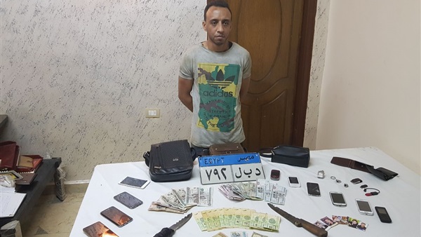 أحد المتهمين المقبوض