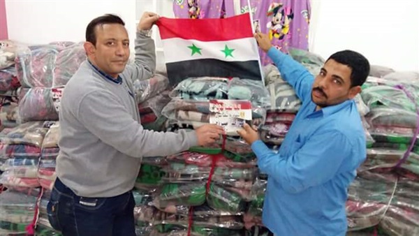 اللجنة الشعبية-المصرية-توزيع